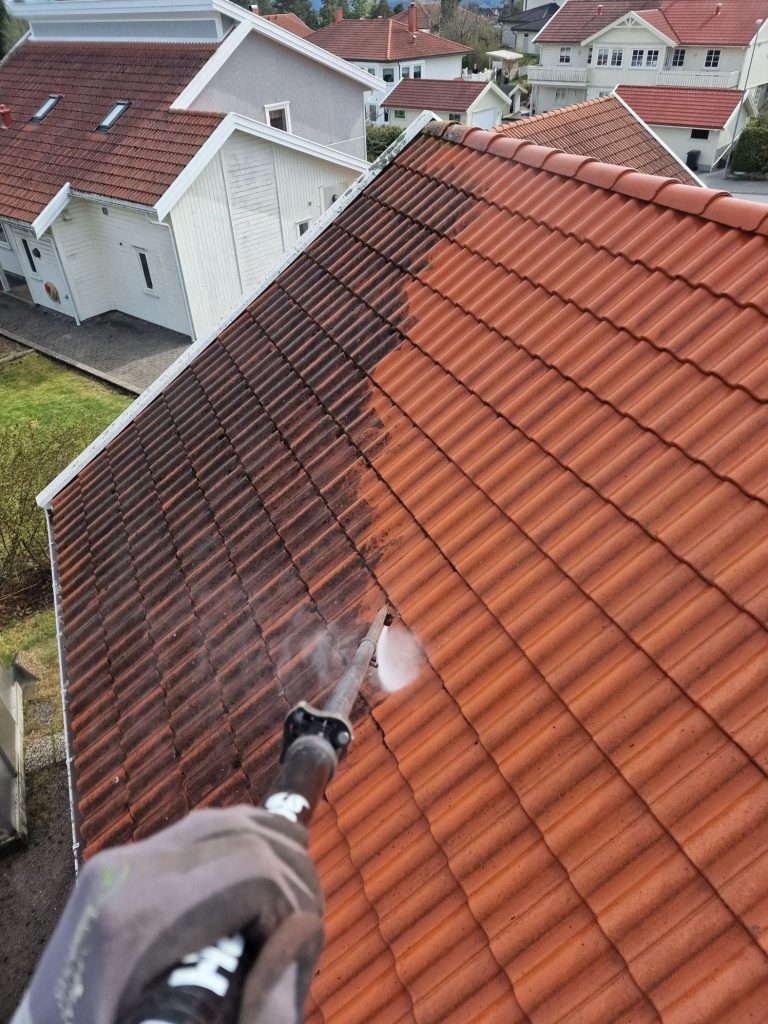 Power washing a roof